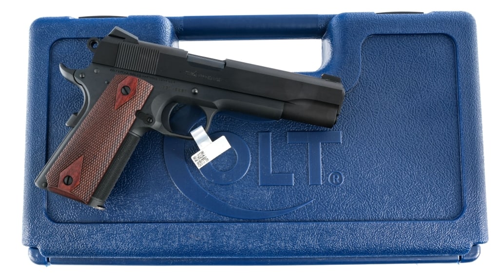 Employee Colt Govt Model 1911 Limited Edition .45: Description Employee Owned Colt Series 70 Government Model 1911 Limited Edition in .45 ACP with one, seven round removable magazine and a 5" National Match barrel. From the collection of Kevin Langevi