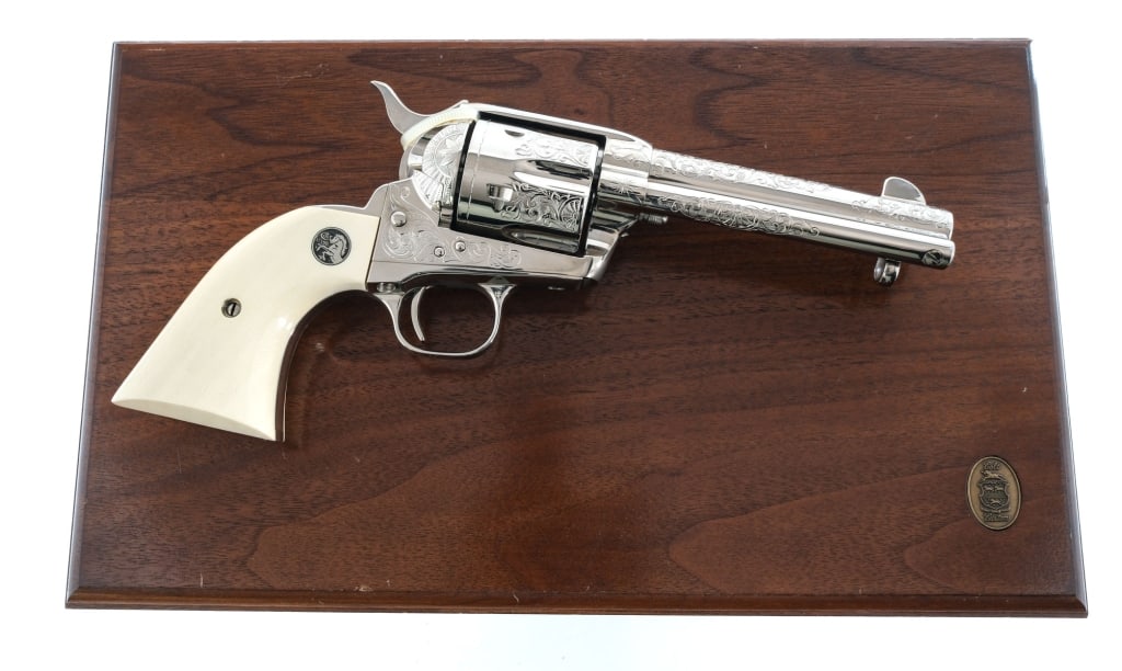 Colt Engraving Sampler Edition .45 LC Revolver: Description Colt Engraving Sampler Edition in .45 Long Colt with a six round capacity and a 4.75" barrel. Former Colt Employee owned. Made in Hartford Connecticut in 1990. Engraved natural grip plates