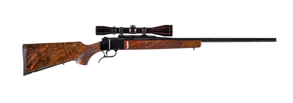 Engineering Vault Colt / Sharps .243 Win Rifle: Description From the collection of Kevin Langevin. Colt / Sharps Deluxe Single Shot Falling Block Sporting Rifle chambered in .243 Winchester with a 26" heavy barrel. One of only 502 manufactured.