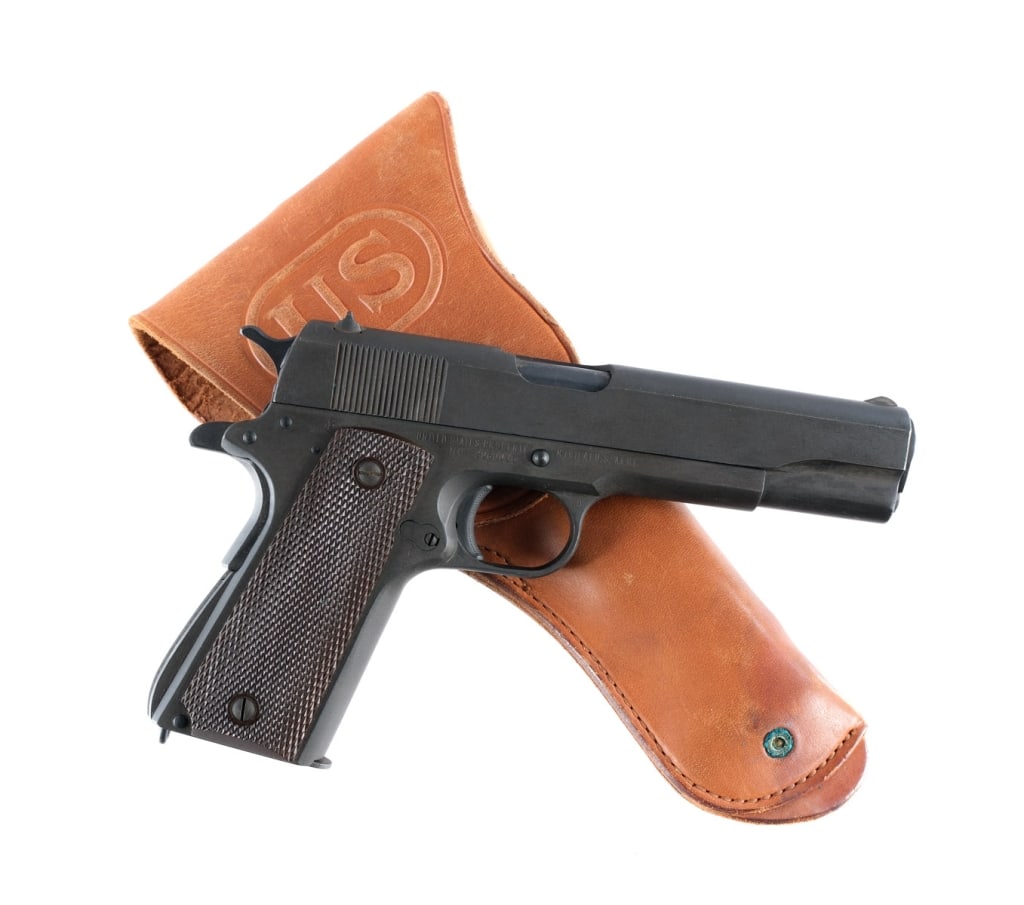 Remington Rand 1911A1 .45 ACP Semi Auto Pistol: Description WWII Remington Rand 1911 A1 chambered in .45 ACP with one, seven round blued unmarked magazine and a 5" High Standard barrel. Manufactured between 1944 and 1945 with serial number