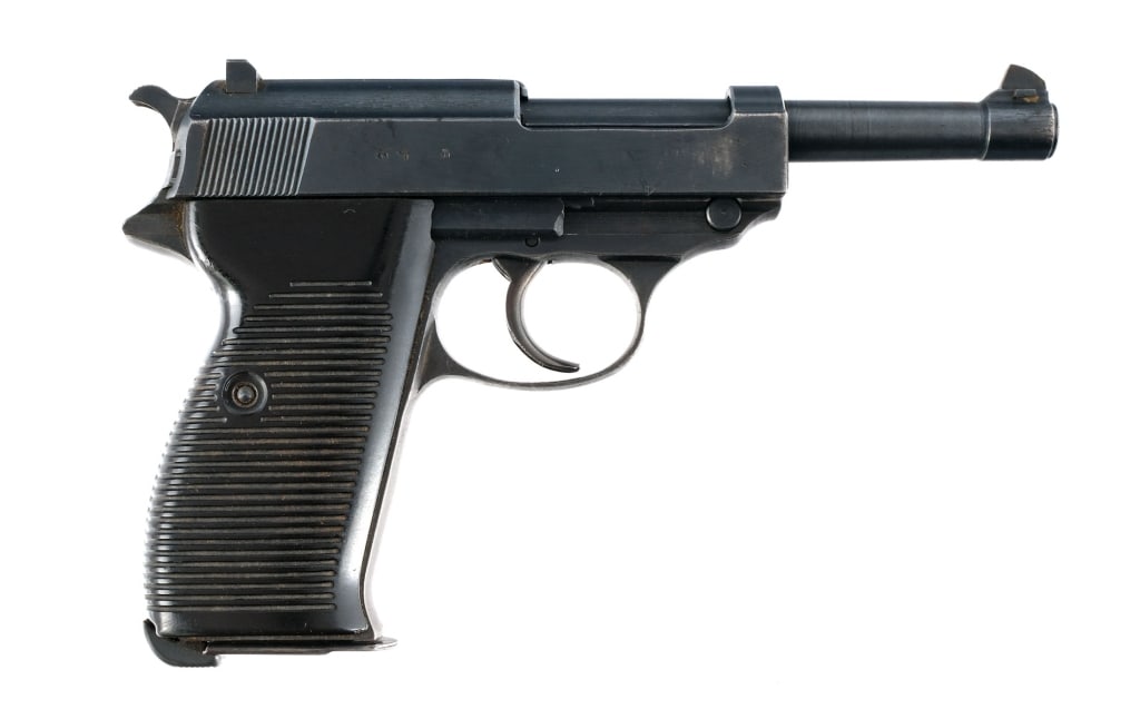 Spreewerk P38 CYQ P38 9mm Semi Auto Pistol: Description Spreewerk (CYQ) P38 in 9mm with one, eight round removable magazine and a 5" barrel. Manufactured in July of 1944. Blued steel frame with ribbed Bakelite grips and a heel magazine