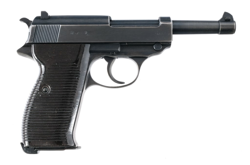 Spreewerk P38 CYQ P38 9mm Semi Auto Pistol: Description Spreewerk (CYQ) P38 in 9mm with one, eight round removable magazine and a 5" barrel. Manufactured in January of 1944. Blued steel frame with ribbed Bakelite grips and a heel magazine