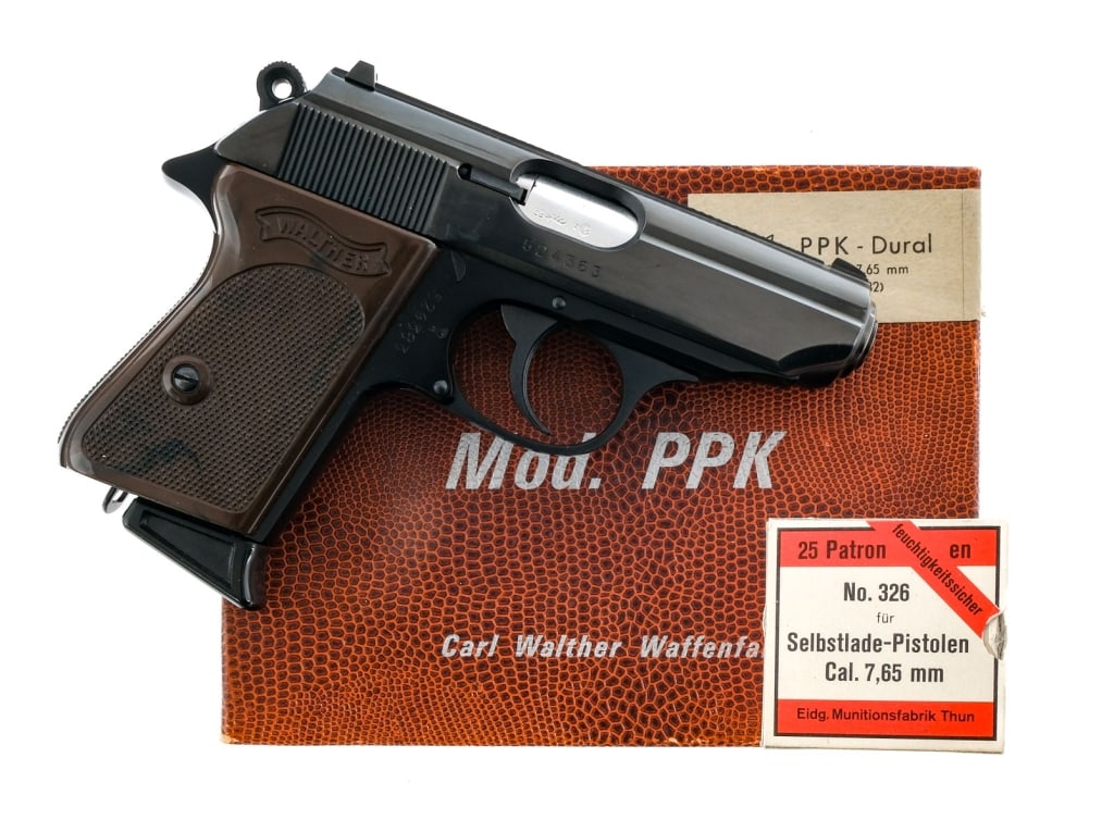 Walther PPK-L Dural .32 ACP Semi Auto Pistol: Description West German Walther PPK-L ( Lightweight ) Dural in 7.65 (.32 ACP) with one, seven round removable magazine and a 3.25" barrel. Mfg in 1960s. Checkered composite grip plates. Blued alloy