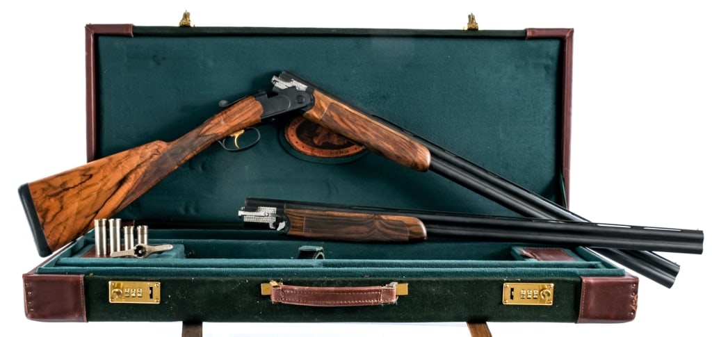 Beretta / Orvis Uplander 20 / 28Ga O/U Shotgun: Description Beretta / Orvis Uplander 2 barrel set in 28 gauge 2 3/4" or 20 gauge 2 3/4"-3" with a two round capacity and 28" over under top rib vented barrels with removable chokes. Made in Italy in 2