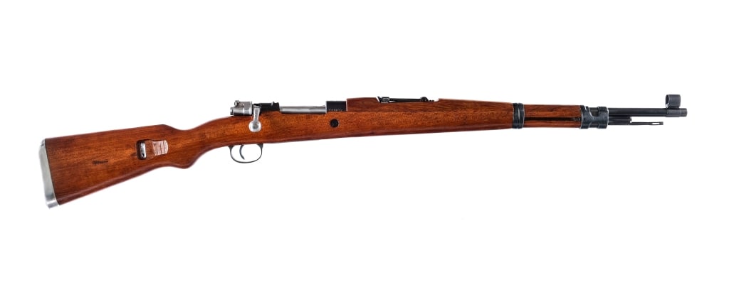 Zastava M48 8mm Bolt Action Rifle: Description Zastava Yugoslavian M48 Mauser chambered in 7.92x57mm Mauser (8mm) with a five round capacity and a 24" barrel. Imported by MMC, marked on the barrel. Front cleaning rod and bayonet lug. A