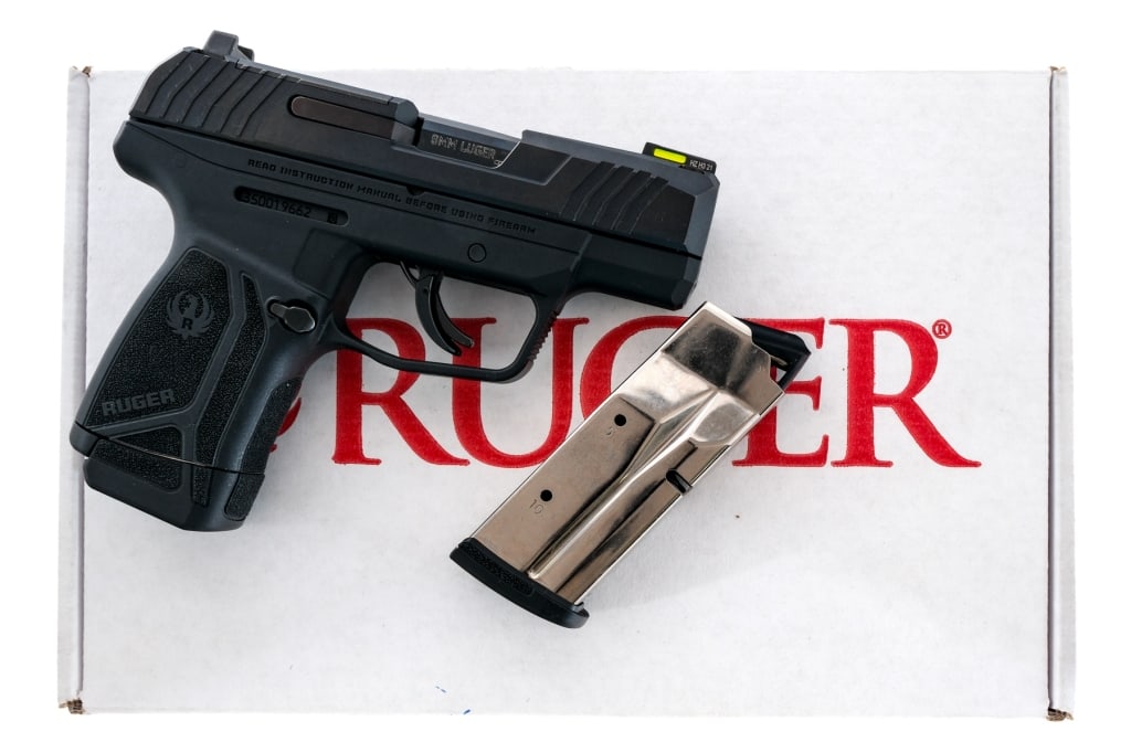 Ruger Max-9 9mm Semi Auto Pistol: Description Ruger Max-9 chambered in 9mm with two, ten round removable magazines and a 3.2" barrel. Manufactured in 2021. Integrated glass filled nylon frame with textured grip. Striker fired single a