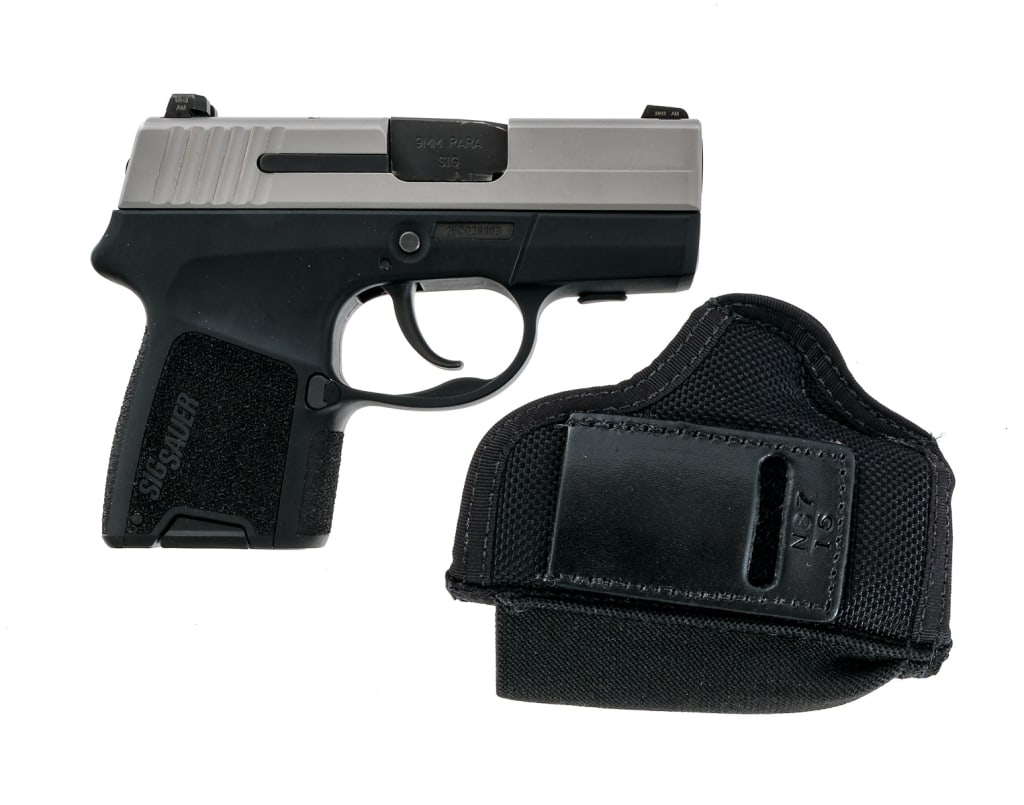 Sig Sauer P290RS 9mm Semi Auto Pistol: Description Sig Sauer P290-RS in 9mm with one, eight round removable magazine and a 3" barrel. Textured polymer frame. Double action trigger and bobbed hammer. Stainless serrated slide with three-dot 