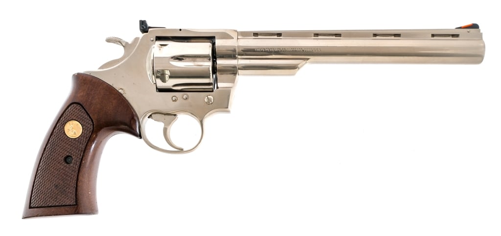 Colt Trooper MK V .357 Magnum Revolver: Description Colt Trooper MK V chambered in .357 Magnum with a six-shot cylinder and a 8" vented rib barrel. Manufactured in 1982 with serial number 04900V. Polished nickel finish. Checkered wood grips