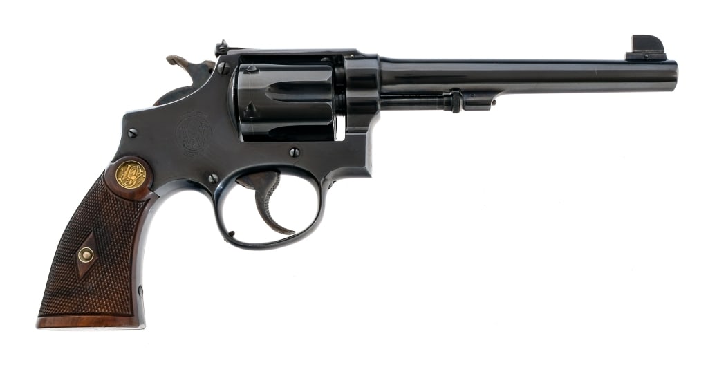 Smith & Wesson M&P 1905 .38 S&W Spl Revolver: Description Smith & Wesson Military & Police Model of 1905 3rd Change in .38 S&W Special with a six round capacity and a 6" barrel. Made in Springfield Massachusetts between 1909 and 1915. Checkered d