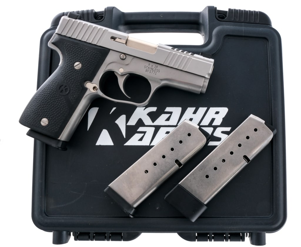 Kahr K9 Limited 2 9mm Semi Auto Pistol: Description Kahr Arms K9 Limited 2 chambered in 9mm with three magazines and a 3.5" barrel. Two, seven round magazines, and one, eight round extended magazine. Stainless steel frame with textured rubb