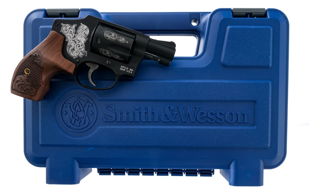 S&W 442-1 Engraved .38 SPL +P Revolver: Description Smith & Wesson 442-1 chambered in .38 Special +P with a five-shot cylinder and a 1.875" snub nose carbon steel barrel. Diamond-tipped machine tool scroll engraving on the frame and cylinde