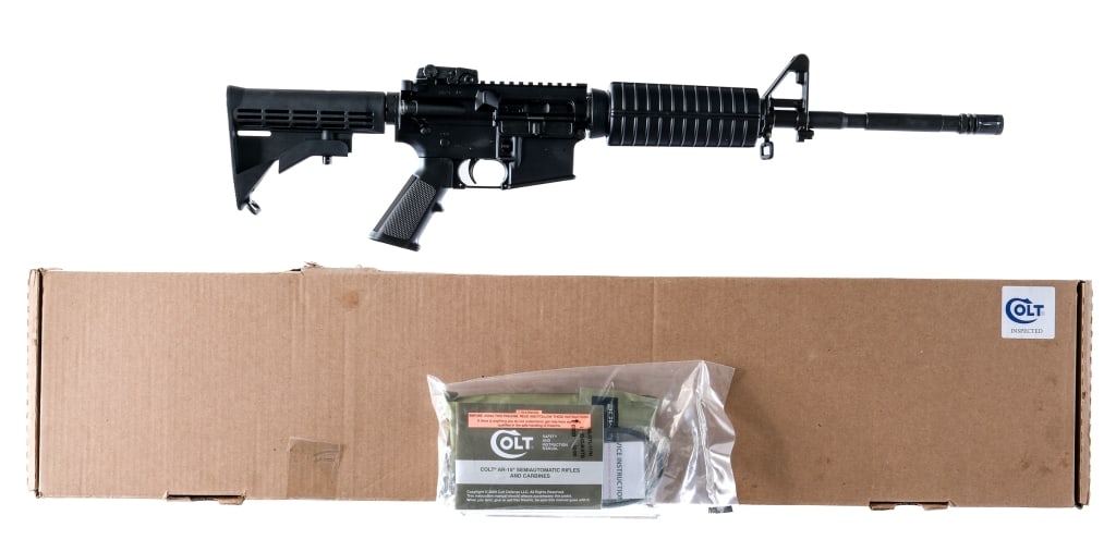 Colt Carbine 5.56x45mm Semi Auto Rifle: Description Colt Carbine chambered in 5.56x45mm NATO with one, thirty round Magpul magazine and a 16.5" 1/7 twist government profile barrel. A2 birdcage flash hider. A2 front gas block with adjustable
