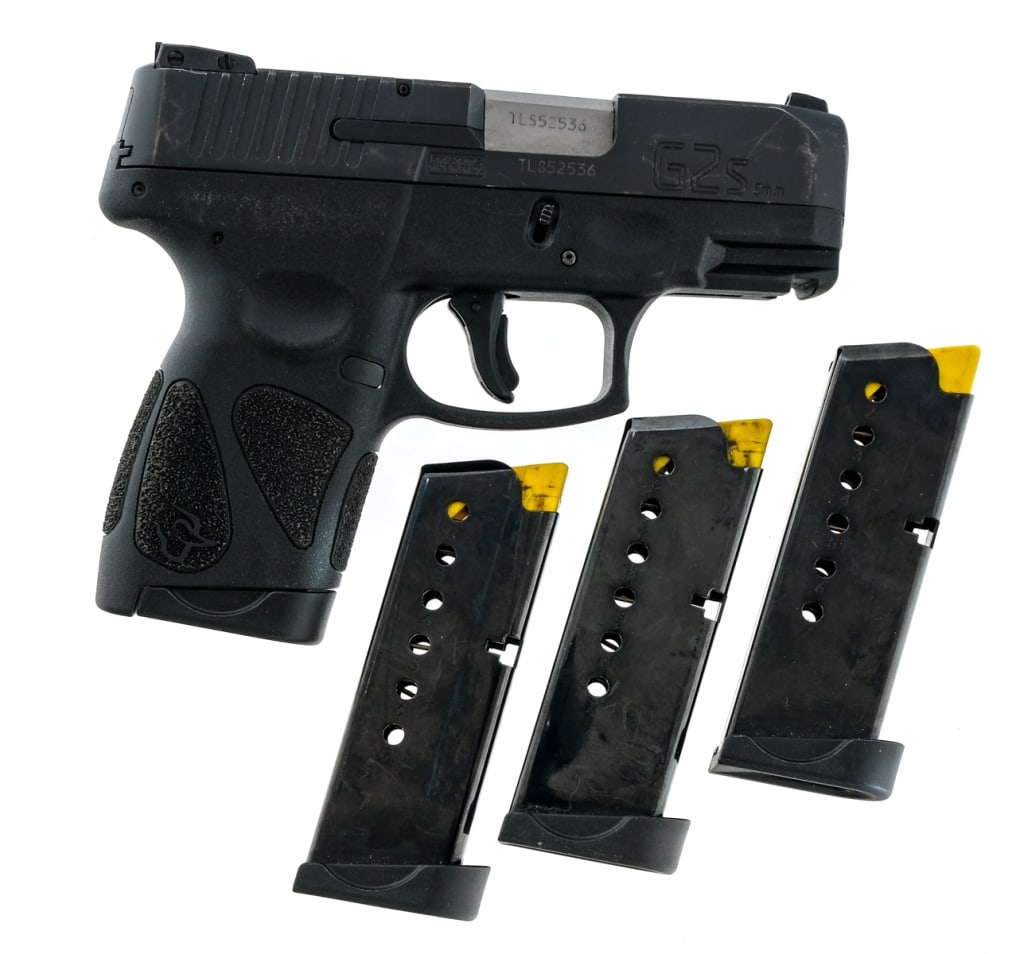 Taurus G2S 9mm Semi Auto Pistol: Description Taurus G2S in 9mm with four, seven round removable magazines and a 3.25" barrel. Textured black composite frame. Blued serrated slide. Left side of frame safety switch, slide release and m