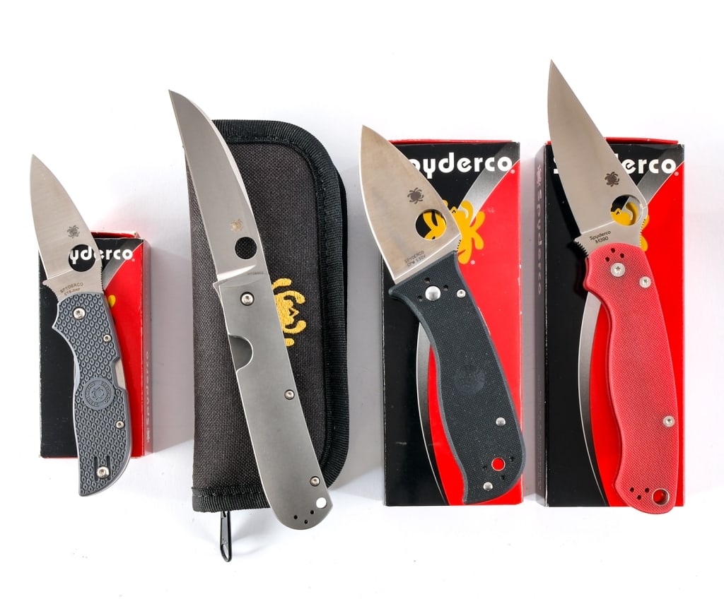 Spyderco Folding Knife Lot Four Knives: Description This lot is for four Spyderco folding knives. First is a Paramilitary 2 Red. 3.44" Blade length and 8.25" OAL. CTS BD1N steel blade. Red polymer handle. Made in the USA. Second is a Lil' T