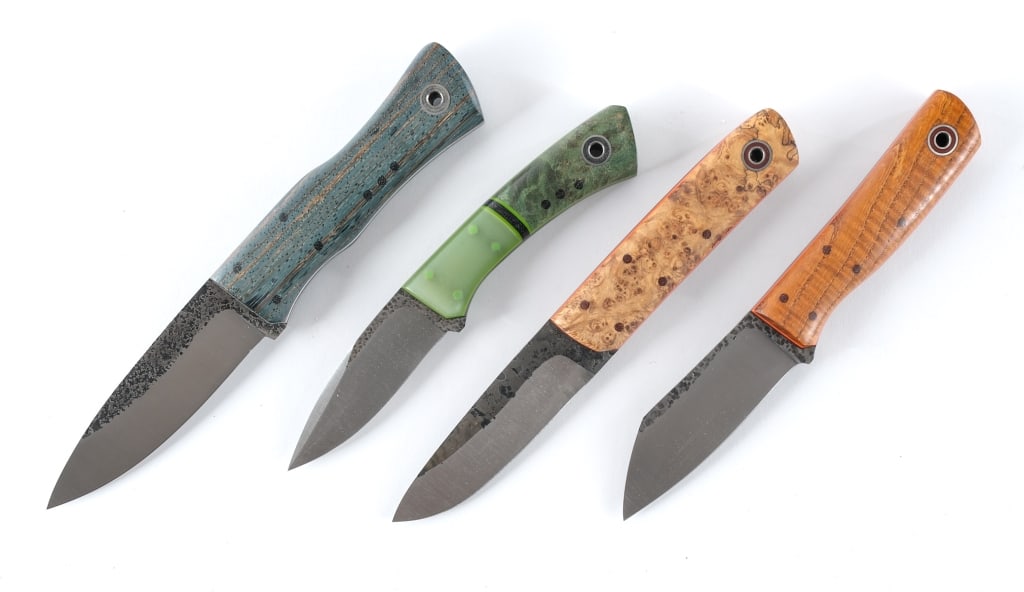 Fiddleback Forge By Andy Roy 4 Pcs Knife: Description This lot is for four handmade artisan fixed blade knives by Fiddleback Forge/Andy Roy. Ergonomic design with composite and natural wood grip plates. Blue wood has a 4.25" blade, regular wo