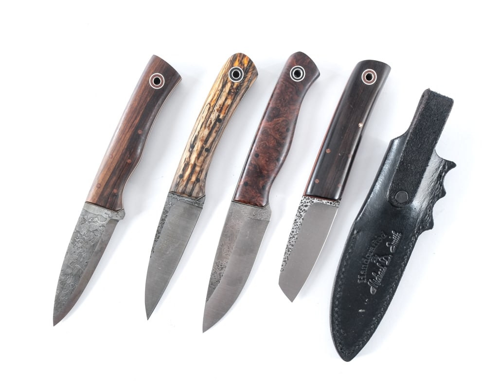 Fiddleback By Andy Roy 4 Pcs Knife: Description This lot is for four handmade artisan fixed blade knives by Fiddleback Forge/Andy Roy. Ergonomic design with composite and natural wood grip plates. Wood with white stripe and name on the 
