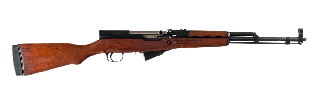 Norinco Type 56 SKS 7.62x39mm Semi Auto Rifle: Description Chinese Norinco Type 56 SKS chambered in 7.62x39mm with a ten round integral magazine and a 20" barrel. Imported by GBE H.B., marked on the right side of the receiver. Front cleaning rod. 