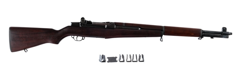Springfield Armory M1 Garand .30-06 Rifle: Description Springfield Armory M1 Garand chambered in .30-06 Springfield with an eight round en-bloc clip fed magazine and a 24" barrel. Post war production with serial number 7003264. Front bayonet l