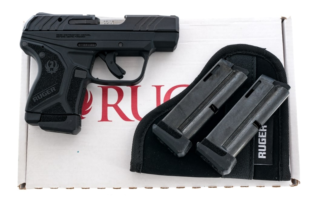 Ruger LCP II .22 LR Semi Auto Pistol: Description Ruger LCP II chambered in .22 Long Rifle with three, ten round magazine and a 2 3/4" barrel. Manufactured in 2025 with serial number 381139119. Textured polymer frame with manual de-cocker
