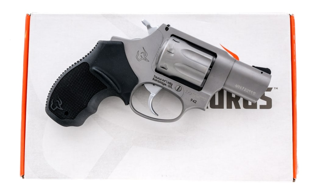 Taurus 942 .22 Long Rifle Revolver: Description Taurus 942 chambered in .22 Long Rifle with an eight-shot cylinder and a 2" snub nose barrel. Matte stainless steel barrel, frame and cylinder. Stainless steel double action trigger and ha