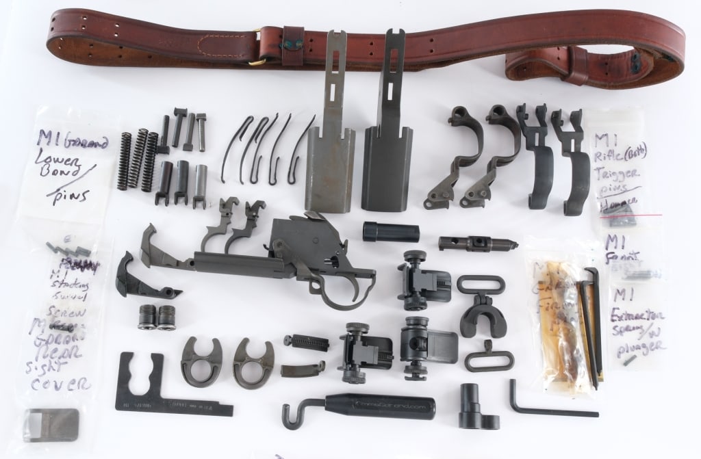Miscellaneous M1 Garand Parts Lot: Description This lot is for varying parts for M1 Garand rifles. Parts are listed as follows. One complete trigger housing marked "D28290-18SA". Has an International Harvester hammer marked "C-5546008 