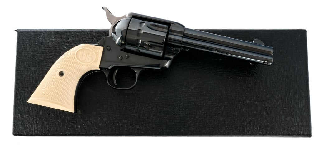 US Firearms 12/22 .22 LR SA Revolver: Description US Firearms 12/22 chambered in .22 long rifle with a twelve-shot cylinder and a 4 3/4" barrel. Glossy blued barrel, frame, and fluted cylinder. Single action trigger. White hard rubber gri