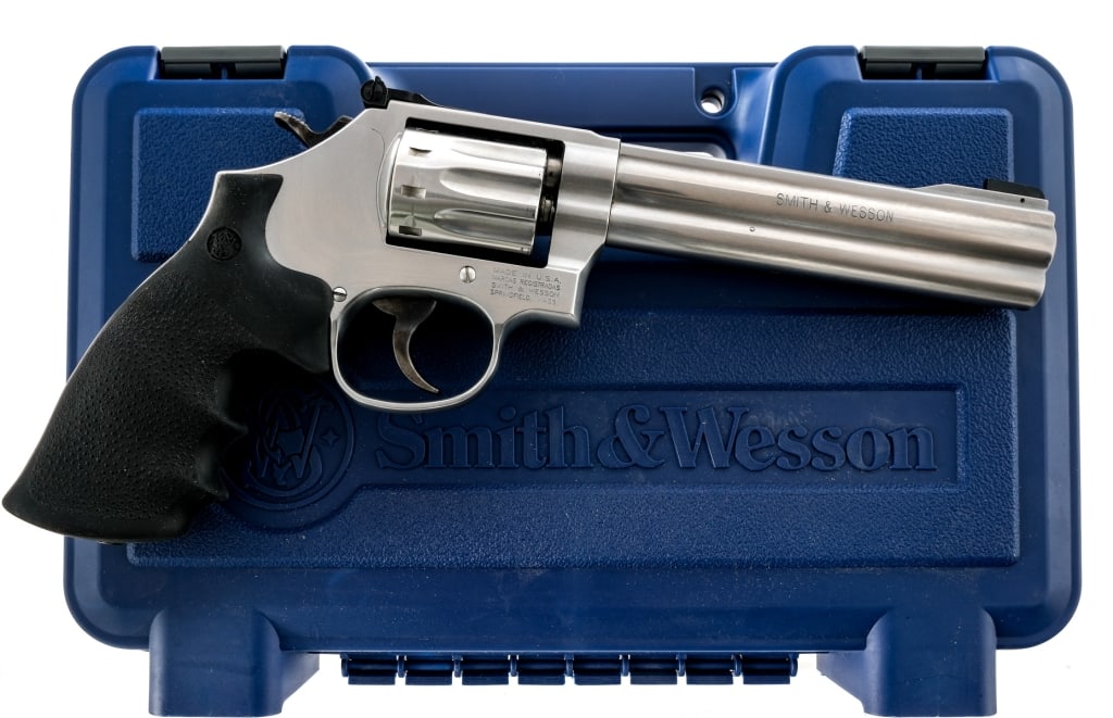 Smith & Wesson 617-6 .22 LR Revolver: Description Smith & Wesson 617-6 chambered in .22 long rifle with a ten-shot cylinder and a 6" barrel. Stainless steel barrel, frame, cylinder, and checkered cylinder release. Case colored trigger