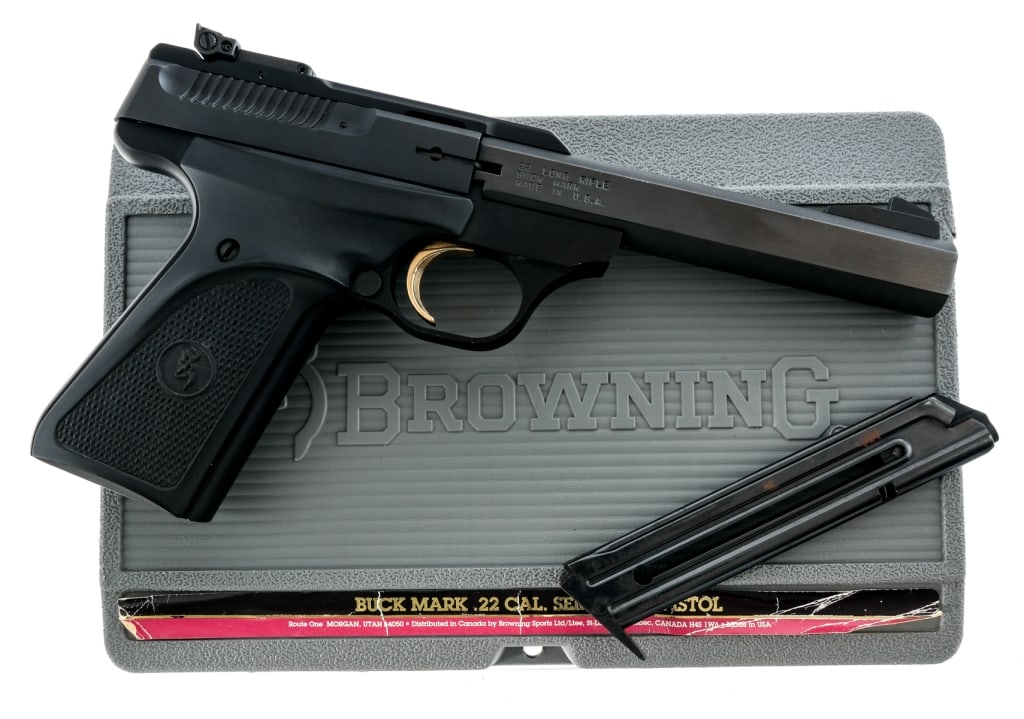 Browning Buck Mark .22 LR Semi Auto Pistol: Description Browning Buck Mark chambered in .22 long rifle with one, ten round magazine and a 5.5" squared barrel. Black finished alloy frame with checkered polymer grips. Gold plated trigger. Frame m