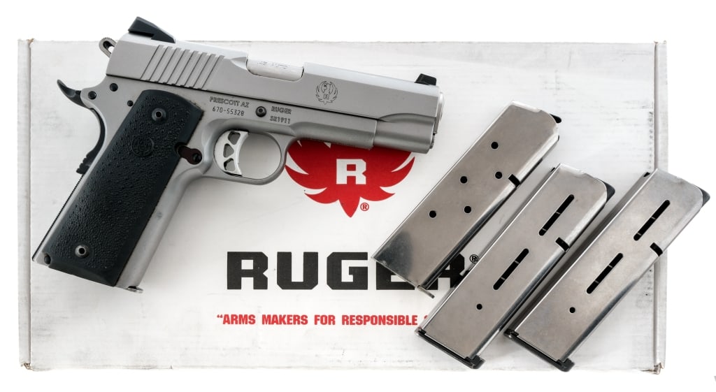 Ruger SR1911 .45 ACP Semi Auto Pistol: Description Ruger SR1911 chambered in .45 ACP with four magazines and a 4 1/4" barrel. Manufactured in 2013 with serial number 670-55328. Stainless steel frame. Textured Hogue rubber grips. Single act