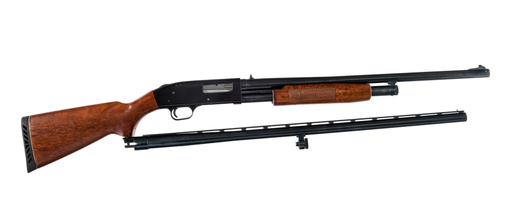 Mossberg 500AT 12 Ga Pump Action Shotgun: Description Mossberg 500AT chambered in 12 gauge for 2 3/4" and 3" shells with a tube magazine and a 18 3/4" barrel with a fixed CYL choke. Blued barrel, magazine tube, trigger, and action release. Bl
