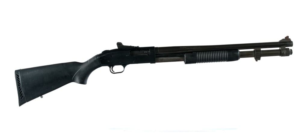 Mossberg 590 12 Ga Pump Action Shotgun: Description Mossberg 590 in 12 Gauge for 2 3/4" and 3" shells with an eight round tube magazine and a 20" barrel. Fixed cylinder choke. Rubber butt pad. Composite stock and front forend. Matte