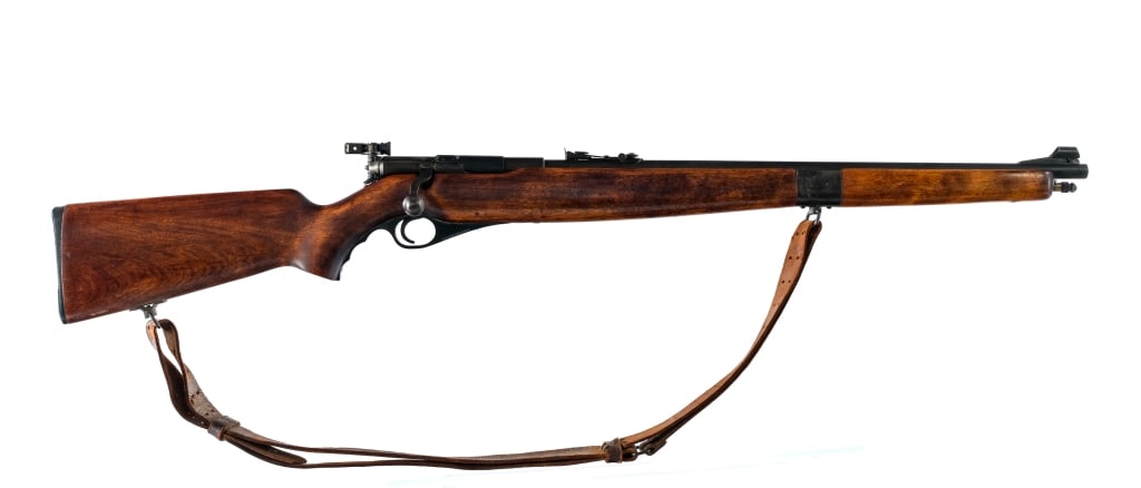 O.F. Mossberg & Son 46M .22 Bolt Action Rifle: Description O.F. Mossberg & Sons 46M ( a ) in .22 Short, Long or Long Rifle with a varied capacity and a 23" barrel. Smooth Monte Carlo style wood stock. Black composite trigger guard. Blued trigger,