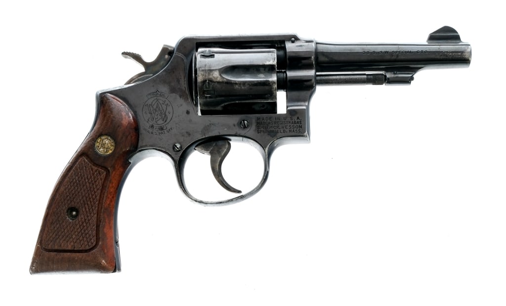 Smith & Wesson 10-5 .38 S&W Spl Revolver: Description Smith & Wesson Model 10-5 in .38 S&W Special with a six round capacity and a 4" barrel. Made in Springfield Massachusetts between 1963 and 1965. Checkered wood grip plates with