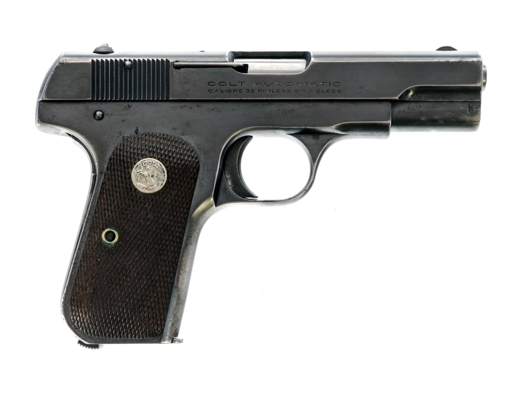 Colt M1903 Pocket Hammerless .32 ACP Pistol: Description Colt M1903 Pocket Hammerless chambered in .32 ACP with one, eight round magazine and a 3 3/4" barrel. Manufactured in 1936 with serial number 518711. Blued steel frame with heel magazine