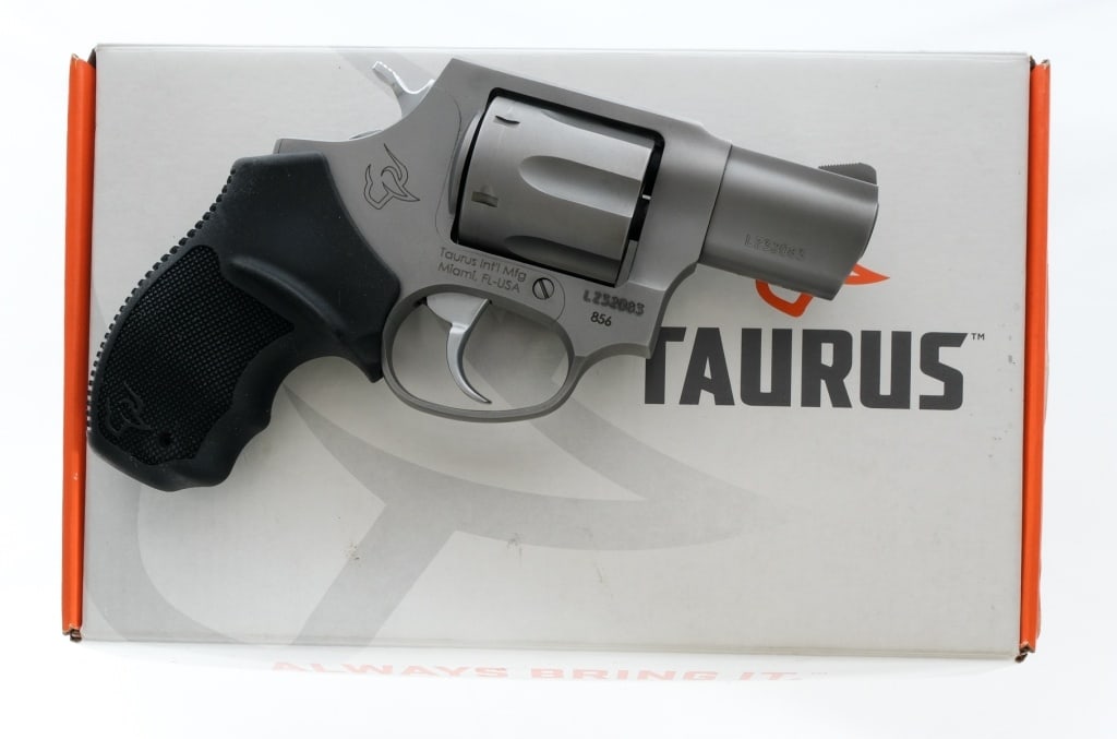 Taurus 856 .38 Spl Revolver: Description Taurus 856 in .38 Special with a six round capacity and a 2" barrel. Textured rubber Taurus grips with finger grooves. Matte stainless finished frame, cylinder, barrel, trigger, checkered