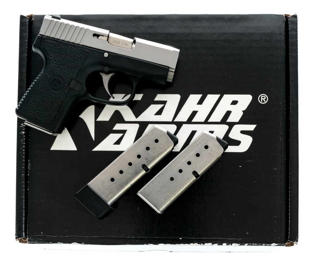 Kahr Arms CW 380 .380 ACP Semi Auto Pistol: Description Khar Arms Model CW380 in .380 ACP with three varied capacity magazines and a 2.5" barrel. Composite grip on frame. Matte stainless steel slide. Left side magazine release and slide release
