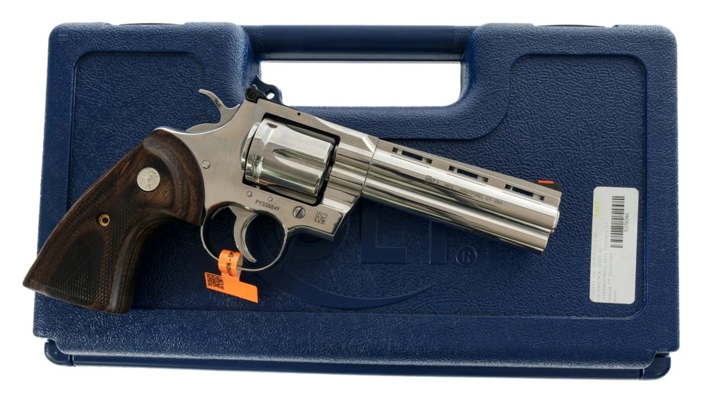 Colt Python .357 Magnum Revolver: Description Colt Python chambered in .357 Magnum with a six-shot cylinder and a 5" vented rib barrel. Polished stainless steel construction and finish. Checkered wood grips with Silver Rampant Colt