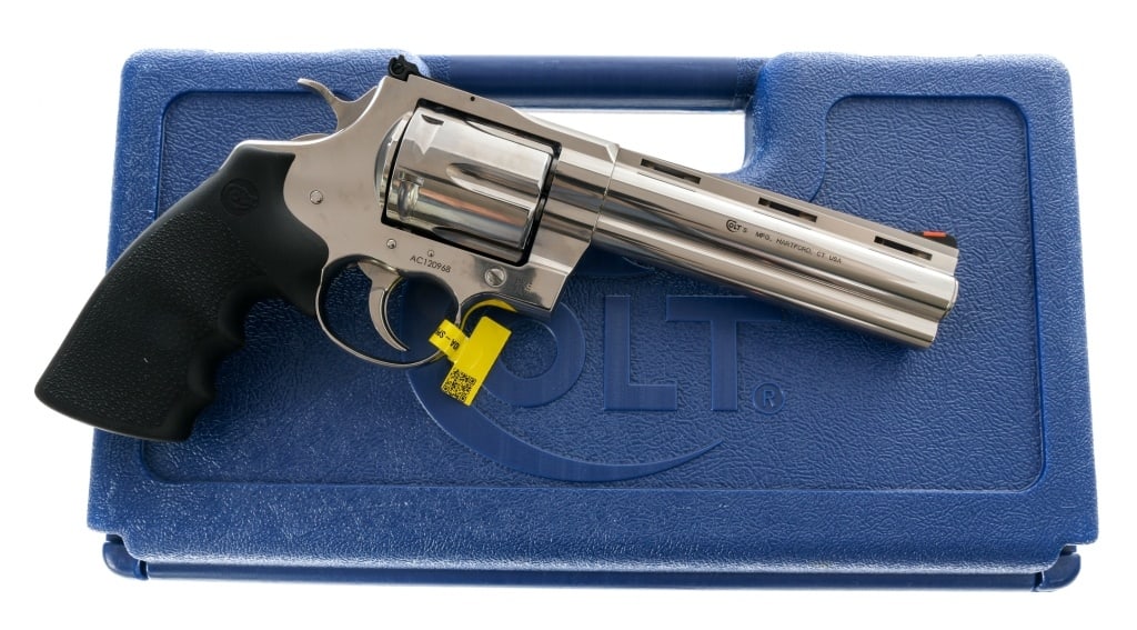 Colt Anaconda .44 Remington Magnum Revolver: Description Colt Anaconda chambered in .44 Remington Magnum with a six-shot cylinder and a 6" vented rib barrel. Polished stainless steel construction and finish. Pebble textured rubber grips.