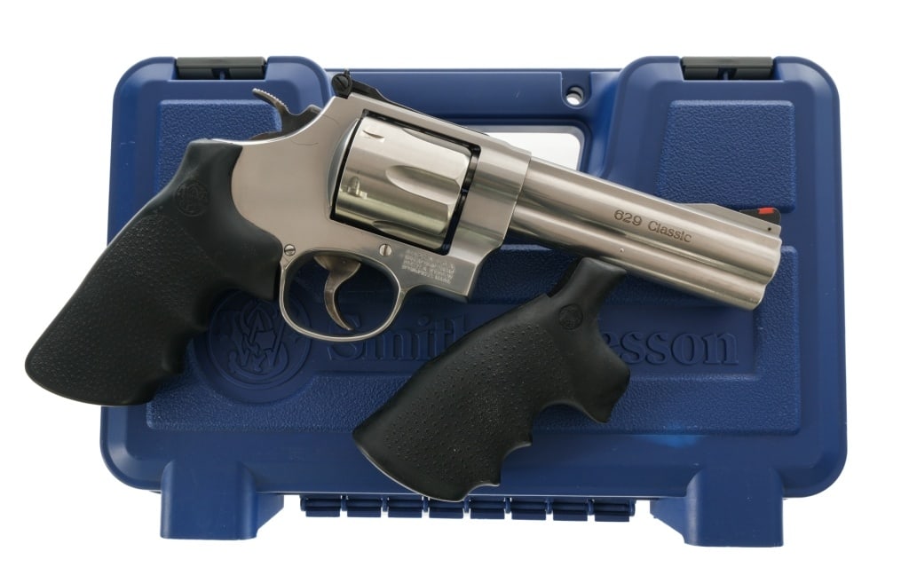 Smith & Wesson 629-6 .44 Magnum Revolver: Description Smith & Wesson 629-6 chambered in .44 Remington Magnum with a six-shot cylinder and a 5" barrel. Stainless steel barrel, frame, fluted cylinder and checkered cylinder release. Case