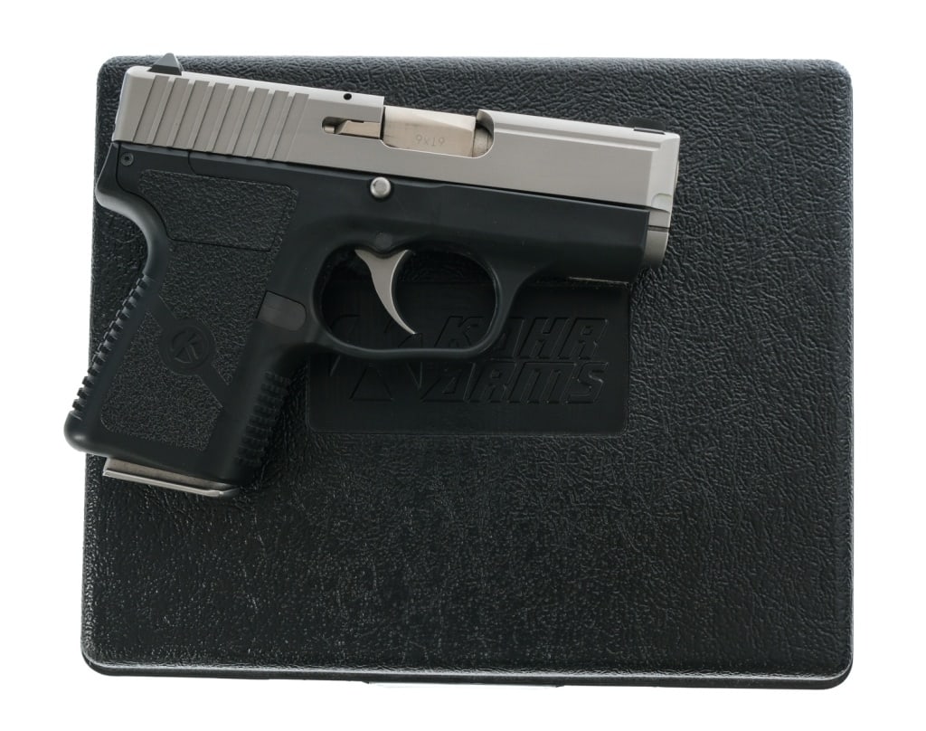 Kahr Arms PM9 9mm Semi Auto Pistol: Description Kahr Arms PM9 chambered in 9mm with one, six round magazine and a 3" barrel. Textured polymer frame. Stainless trigger and thumb safety. Stainless steel serrated slide. Front and rear whit