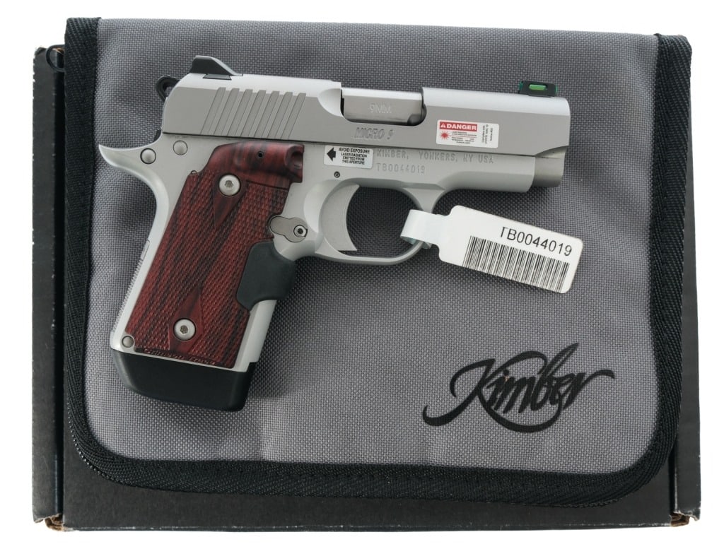 Kimber Micro 9 STS 9mm Semi Auto Pistol: Description Kimber Micro 9 chambered in 9mm with one, seven round removable magazine and a 3 1/8" barrel. Aluminum frame with checkered Rosewood Laser grips. Single action trigger and hammer. Frame mo