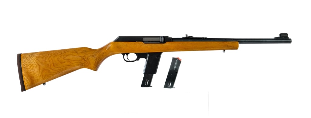 Marlin 9 Camp Carbine 9mm Semi Auto Rifle: Description Marlin Model 9 Camp Carbine chambered in 9mm with two magazines and a 16.5" barrel. One magazine is twelve rounds, the other is twenty rounds. Adjustable rear sight and hooded front blade.