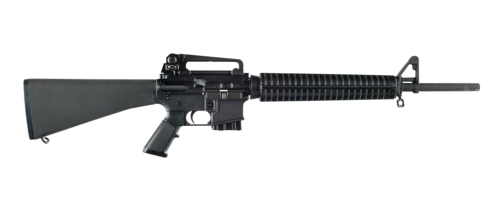 Bushmaster XM15-E2S 5.56x45mm Semi Auto Rifle: Description Bushmaster XM15-E2S chambered in 5.56x45mm with one, ten round magazine and a 20" featureless 1/9 twist barrel. A2 style front gas block with adjustable front sight post. Ribbed polymer ri