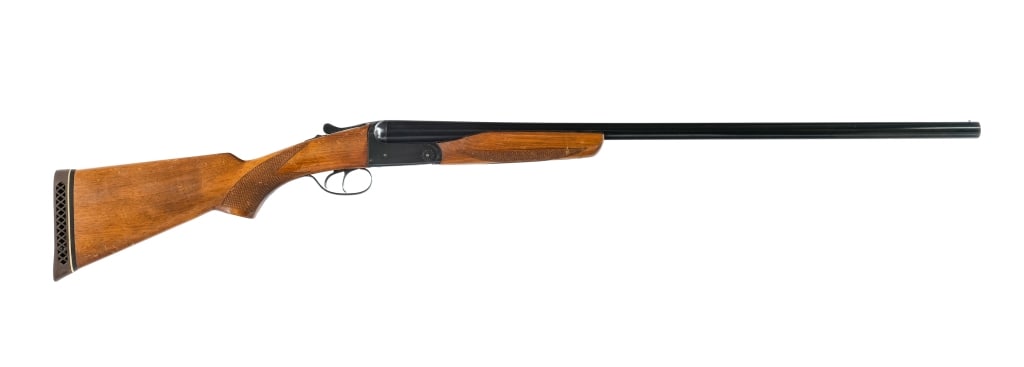 Miroku Liberty 400 12 Ga Side by Side Shotgun: Description Japanese Miroku Liberty Model 400 chambered in 12 Gauge for 2 3/4" shells with 28" side by side barrels. The left bore has a fixed FULL choke and the right has a fixed MOD choke. Bead fron