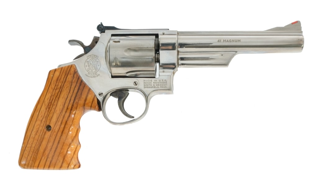 Smith & Wesson 57 .41 Magnum Revolver: Description Smith & Wesson model 57 chambered in .41 Remington Magnum with a six-shot cylinder and a 6" barrel. Manufactured between 1980 and 1983 with serial number N834966. Nickel finished barrel, f
