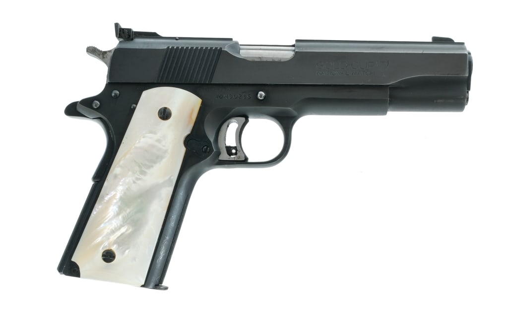 Colt MKIV Series '70 Gold Cup NM .45 ACP 1911: Description Colt MKIV Series '70 Gold Cup National Match chambered in .45 ACP with one, seven round magazine and a 5" NM barrel. Manufactured in 1980 with serial number 70N90215. Blued steel frame wit