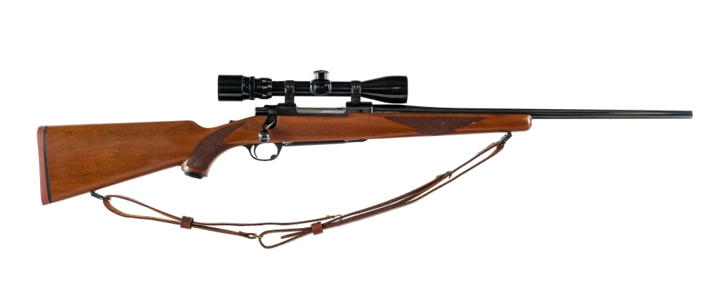 Ruger M77 Tang Safety .270 Win Bolt Action Rifle: Description Ruger M77 chambered in .270 Winchester with a four round magazine and a 22" barrel. Manufactured in 1980 with serial number 74-23941. Grooved receiver with mounted Bushnell Banner 3x-9x. T