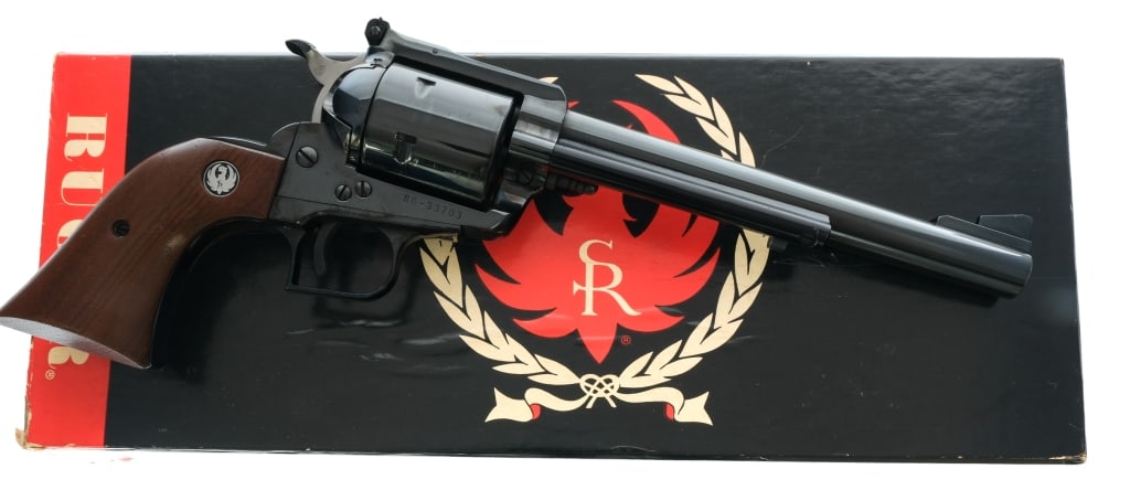 Ruger Super Blackhawk .44 Mag Revolver: Description Ruger Super Blackhawk in .44 Magnum with a six round capacity and a 7.5" barrel. Made in Southport Connecticut in 1971. Smooth wood grip plates with Ruger medallion on each side. Blued tri