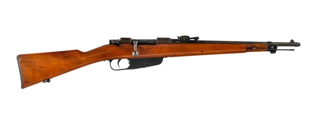 Brescia M91/28 Carcano 6.5x52mm Rifle: Description Italian Brescia M91/28 Carcano chambered in 6.5x52mm Carcano with a six round en-bloc clip fed magazine and a 17.94" barrel. Front bayonet lug and cleaning rod. Adjustable rear sight and f