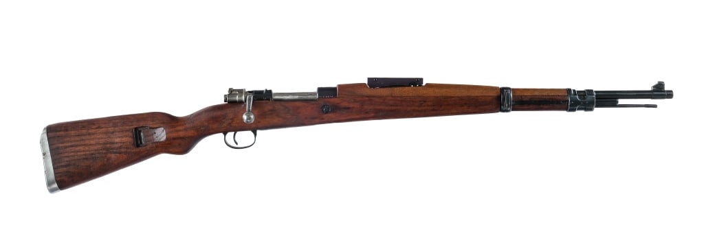 Zastava Yugo M48 8mm Bolt Action Rifle: Description Yugoslavian Zastava M48 in 8mm with a five round capacity and a 24" barrel. Import marked on the front of barrel by : CAI GEORGIA VT. Cupped metal butt plate. Smooth wood stock with matchi